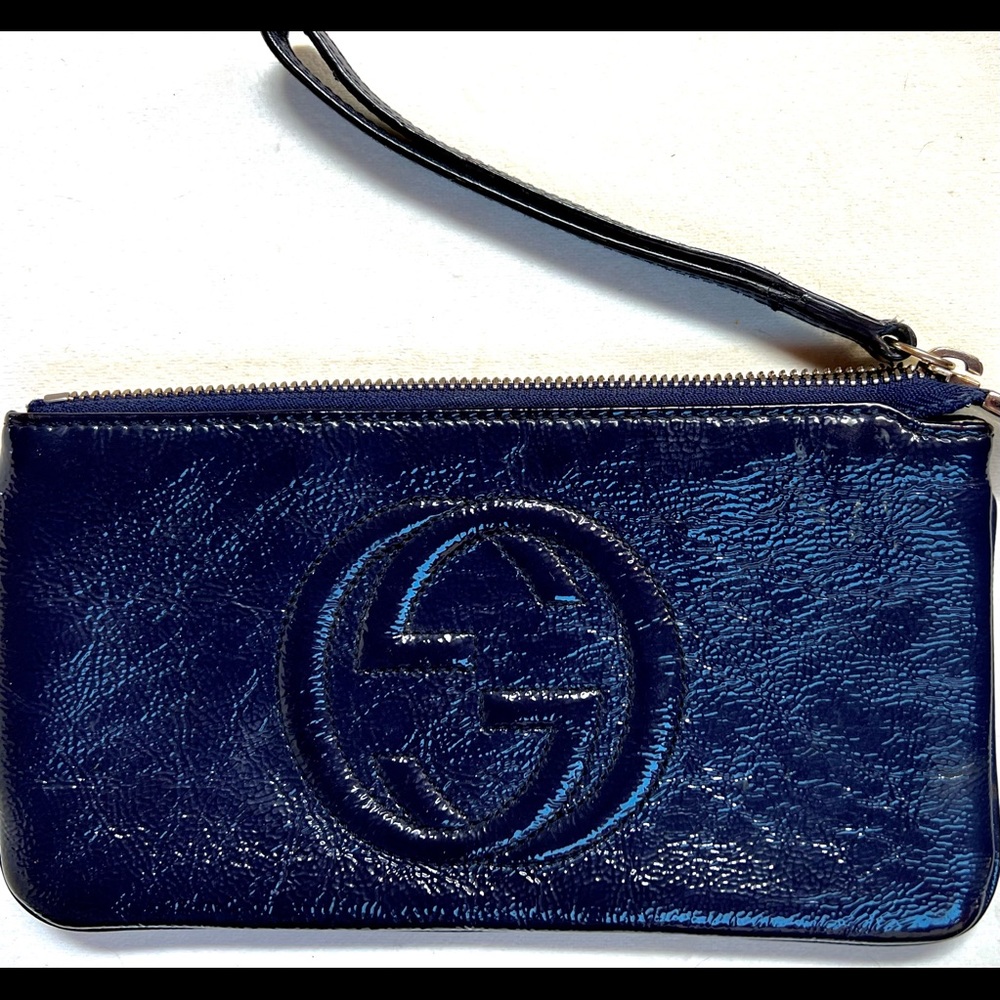 Authentic Gucci supple leather w glitter shine to it.   Navy blue.  Used.